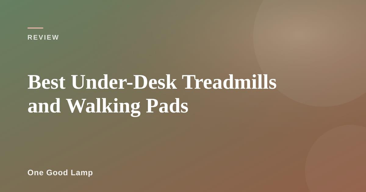 Walking pad positioned under a standing desk in a home office